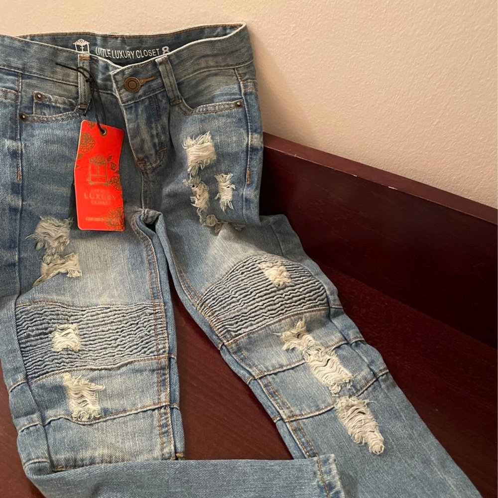 Distressed Blue Jeans